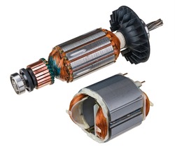 Electric DC motor stator and rotor with plastic fan isolated on a white background. Two engine parts with steel sheets, copper commutator or wire winding and metal ball bearing. Electronics industry.