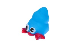 A toy rubber crab with a blue shell. On a white background, isolated.