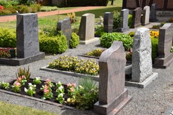 Graves in a well-kept village cemetery