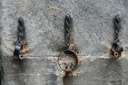 Pillory chains on a medieval church 