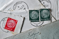 Old envelopes with Hindenburg stamp and the inscription German Reich and handwritten: field post