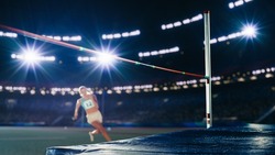 High Jump Championship: Professional Female Athlete on World Championship Running to Jump over Bar. Shot of Competition on Big Stadium with Sports Achievement Experience. Determination of Champion.