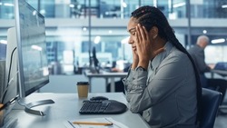 Black Female Corporate Office Worker Feels Stress, Sick, Frustration, Sick Works on Computer. Accountant Feeling Project Pressure, Has Headache Massages Her Head, Works with Statistics, Has Bad Day