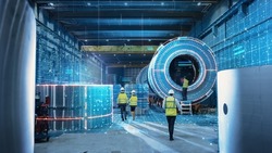 Futuristic Technology Concept: Team of Engineers and Professionals Workers in Heavy Industry Manufacturing Factory that is Visualized with Graphics into Digital Twin of Industry 4.0 High Tech