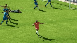 Football Championship: Red Team Forward Shoots: Kicks the Ball and Scores the Goal. Goalkeeper Fails to Catch Ball. Winning the Match and Game, Players Celebrate Tournament Victory