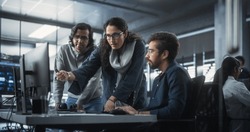 Team of Three Diverse South Asian Software Developers Talk, Discuss a Technological Project. Empowered Indian Female Specialists and Two Colleagues Work on Digital Software as a Service Business
