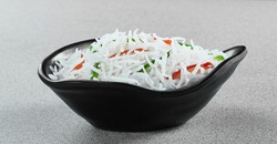 Long Basmati Rice in Different Bowls and Plates