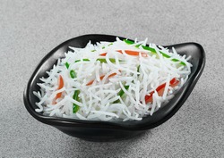 Long Basmati Rice in Different Bowls and Plates
