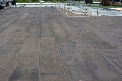 A finished stamped concrete patio floor