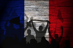 France flag painting on wood and Protesters shadow.