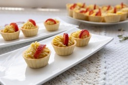 cupcakes with custard and chopped fruits, delicious sweet dessert, cooking and hobbies, food texture details