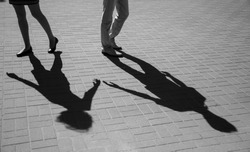 Shadows of two young people, love concept