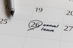 writing on calendar annual leave