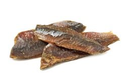 dried fish fillets on a white background