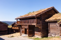 Old traditional Norwegian wooden sod roof houses at Maihaugen Folks museum Lillehammer Oppland Norway Scandinavia