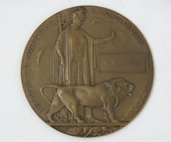 WW1 British Death Plaque also sometimes referred to as the ‘dead man’s penny’. These were sent, along with a certificate from the King, to the next of kin of service personnel who died in WW1