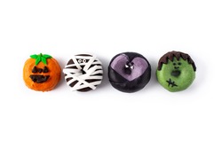 Assortmen of Halloween donuts isolated on white background