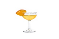 Sidecar cocktail with a sugar rim isolated on white background