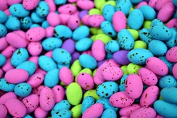 Speckled egg sweets in a pile.