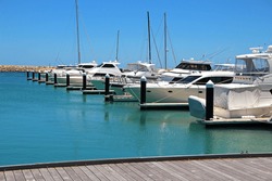 Boats and yachts in a marina.