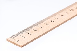 wooden ruler isolated on white background. measure school tool cut out.