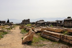 ruins of archaeological site Hierapolis in Turkey - road among the old tombs of Necropolis