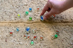 A collection of beads of various colors used in bead play, a traditional Korean game.