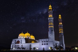Beautiful mosque and starry sky with milky way