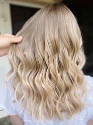 Blond curl hair day light