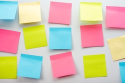 Blank Sticker notes on the white background. Mockup sticky Note Paper. Business people meeting and use post it notes to share idea on sticky note.Discussing business, teamwork, brainstorming concept