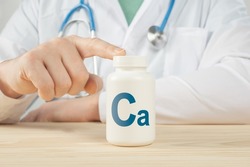 Calcium Ca supplements for Bone human health. Doctor recommends taking calcium Ca. doctor talks about Benefits of calcium. Essential vitamins and minerals for humans. Calcium Health Concept.