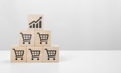 Retail sales growth. Sales volume increase, business growth or increase profit concept. cube with icon growing graph and shopping cart symbol. sale volume increase make business grow.