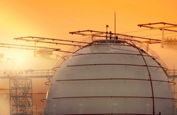 Selective focus on industrial gas storage tank. LNG or liquefied natural gas storage tank. Natural gas storage industry and global market consumption. Global energy crisis concept. 