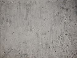 Texture of concrete wall for background. Rough unpainted concrete wall.