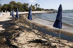 Athens, Greece, September 14 2017: Greek oil spill spreads to Athens Riviera following the sinking of an oil tanker in Saronic Gulf.