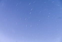 Star trails in the evening sky, a circle of stars in the sky