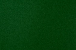 Dark green deep color with gradient paper texture. Minimalistic natural background