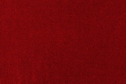 Red velvet paper texture background. Velor suede cardboard with blank surface. Elegant template for banner design