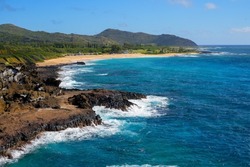 Sandy beach on the eastern coast of O'ahu island in Hawaii along the Kalaniana'ole Highway