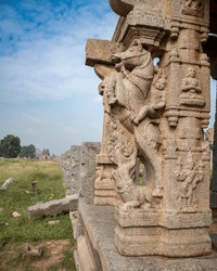 Image of a horse rider near the ancient horse bazar in Hampi which is located near the Virupaksha temple. Hampi, the capital of Vijayanagar Empire is a UNESCO World Heritage site.