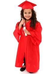 Adorable 4 year old hispanic african american mixed girl in red graduation cap and gown with certificate diploma over white.