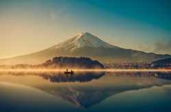 Mount fuji san at Lake kawaguchiko in japan on sunrise.  vintage tone 