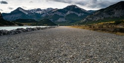 View of a gravel walking path along Barrier Lake in Kananaskis, Alberta