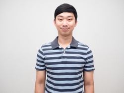 Portrait young man striped shirt gentle smile isolated