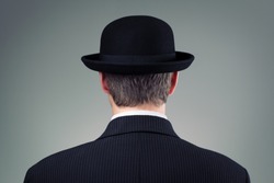 Businessman in bowler hat concept for business, finance, insurance and english culture