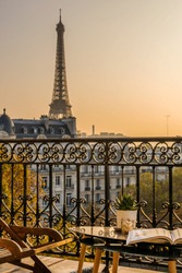 paris balcony with splendid view on eiffel tower at sunset