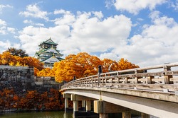 Osaka Castle in Osaka  with autumn leaves, Japan,  landmark of Unesco.