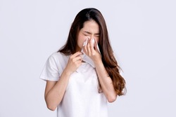 Young beautiful asian woman got sick and flu on white background.