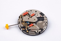 quartz wristwatch movement in old clock isolated