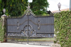 Automatic metal gate with beautiful design. Metal work, automation.